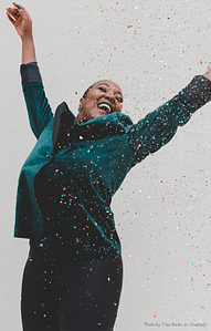 Woman celebrating with confetti